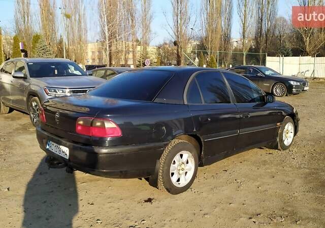 Чорний Опель Омега, об'ємом двигуна 2.5 л та пробігом 400 тис. км за 1650 $, фото 5 на Automoto.ua