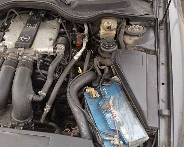 Черный Опель Омега, объемом двигателя 2.5 л и пробегом 328 тыс. км за 3000 $, фото 3 на Automoto.ua