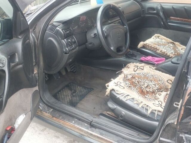 Черный Опель Омега, объемом двигателя 0 л и пробегом 489 тыс. км за 1000 $, фото 12 на Automoto.ua