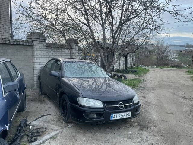 Черный Опель Омега, объемом двигателя 2.5 л и пробегом 250 тыс. км за 1200 $, фото 6 на Automoto.ua