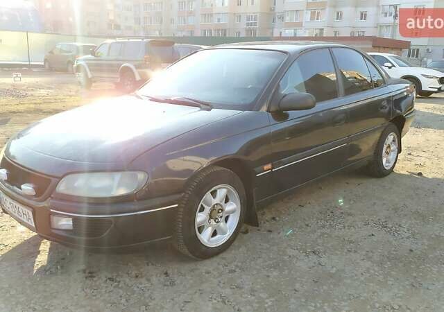 Чорний Опель Омега, об'ємом двигуна 2.5 л та пробігом 400 тис. км за 1650 $, фото 1 на Automoto.ua