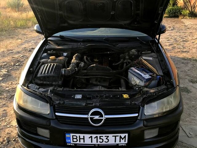 Черный Опель Омега, объемом двигателя 2 л и пробегом 450 тыс. км за 2700 $, фото 2 на Automoto.ua