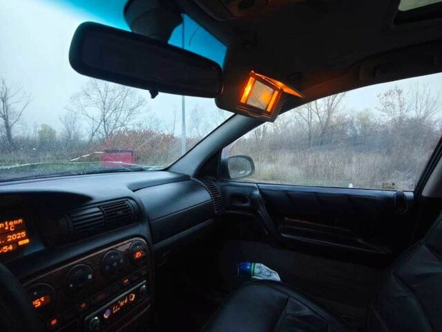 Черный Опель Омега, объемом двигателя 2 л и пробегом 335 тыс. км за 2400 $, фото 16 на Automoto.ua