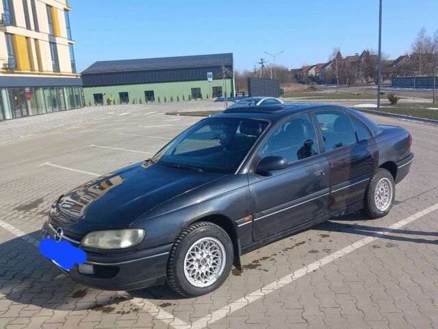 Черный Опель Омега, объемом двигателя 2 л и пробегом 100 тыс. км за 2100 $, фото 2 на Automoto.ua