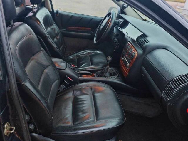 Черный Опель Омега, объемом двигателя 2 л и пробегом 335 тыс. км за 2400 $, фото 12 на Automoto.ua