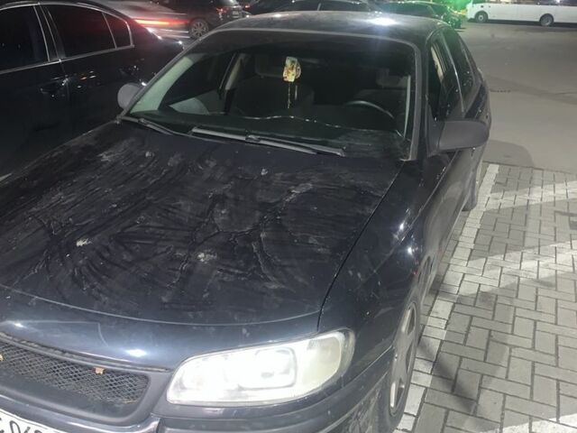 Черный Опель Омега, объемом двигателя 2 л и пробегом 311 тыс. км за 2300 $, фото 4 на Automoto.ua