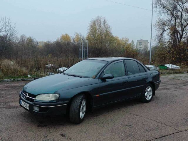 Черный Опель Омега, объемом двигателя 2 л и пробегом 335 тыс. км за 2400 $, фото 21 на Automoto.ua