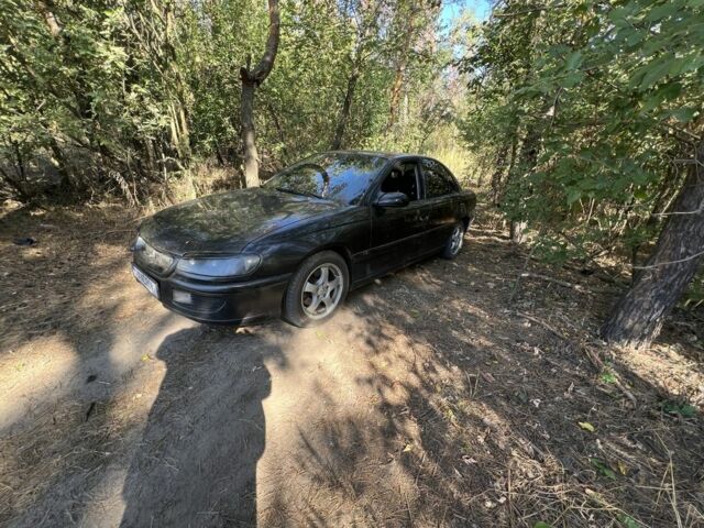 Опель Омега 1996 у Петропавловке на Automoto.ua Чорний Опель Омега, об'ємом двигуна 2 л та пробігом 380 тис. км за 2500 $, фото 1 на Automoto.ua
