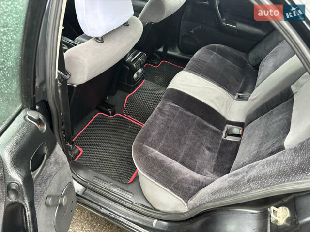 Черный Опель Омега, объемом двигателя 2 л и пробегом 380 тыс. км за 3800 $, фото 12 на Automoto.ua