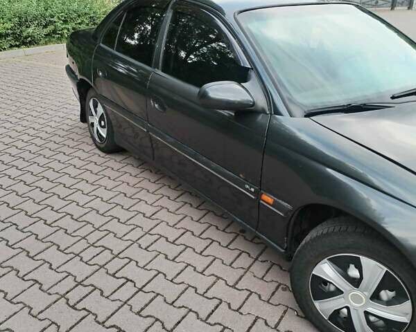 Черный Опель Омега, объемом двигателя 2 л и пробегом 30 тыс. км за 2300 $, фото 8 на Automoto.ua