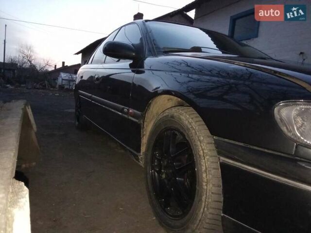 Черный Опель Омега, объемом двигателя 2.5 л и пробегом 500 тыс. км за 2100 $, фото 9 на Automoto.ua