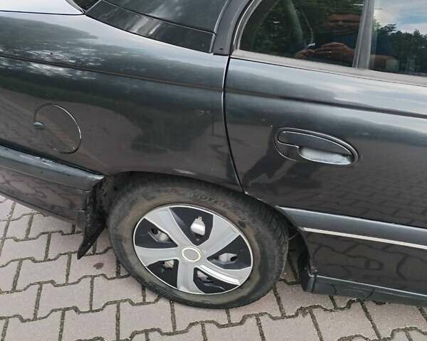 Черный Опель Омега, объемом двигателя 2 л и пробегом 30 тыс. км за 2300 $, фото 7 на Automoto.ua