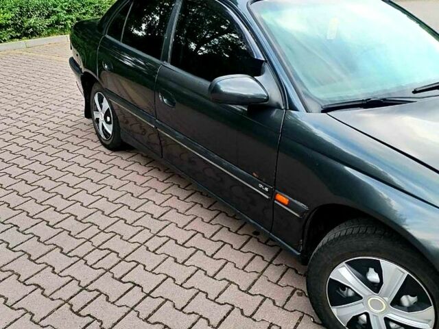 Чорний Опель Омега, об'ємом двигуна 2 л та пробігом 200 тис. км за 2300 $, фото 9 на Automoto.ua