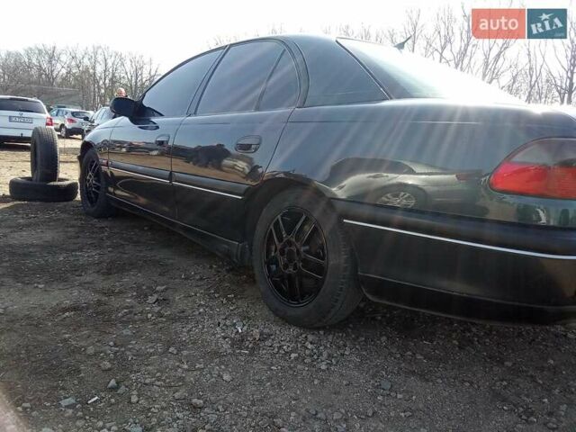 Черный Опель Омега, объемом двигателя 2.5 л и пробегом 500 тыс. км за 2100 $, фото 13 на Automoto.ua