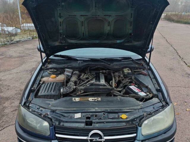 Черный Опель Омега, объемом двигателя 2 л и пробегом 335 тыс. км за 2400 $, фото 14 на Automoto.ua