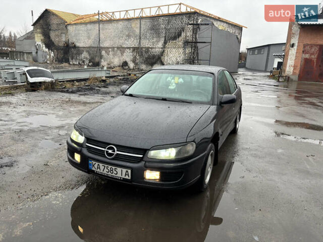 Черный Опель Омега, объемом двигателя 2 л и пробегом 380 тыс. км за 3800 $, фото 1 на Automoto.ua
