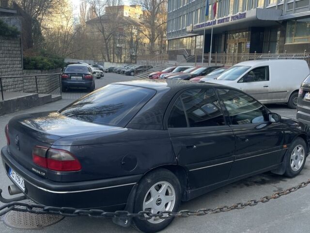 Чорний Опель Омега, об'ємом двигуна 2 л та пробігом 302 тис. км за 3000 $, фото 3 на Automoto.ua