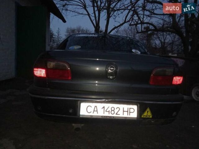 Черный Опель Омега, объемом двигателя 2.5 л и пробегом 500 тыс. км за 2100 $, фото 3 на Automoto.ua