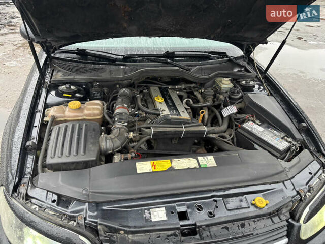 Черный Опель Омега, объемом двигателя 2 л и пробегом 380 тыс. км за 3800 $, фото 17 на Automoto.ua