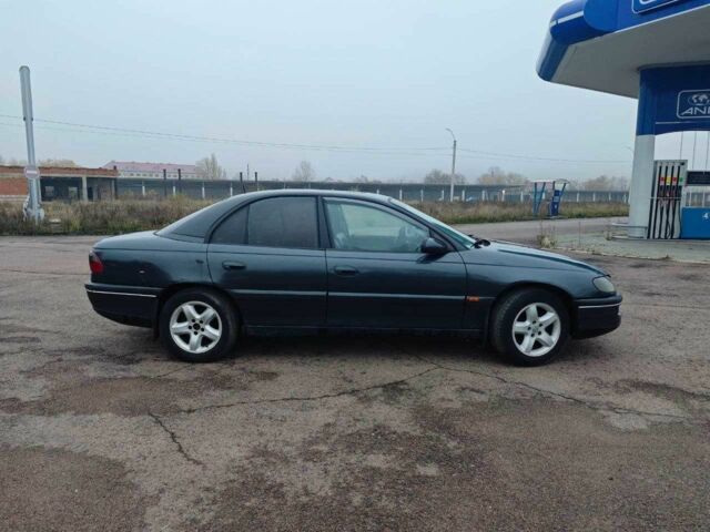 Черный Опель Омега, объемом двигателя 2 л и пробегом 335 тыс. км за 2400 $, фото 22 на Automoto.ua