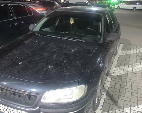 Черный Опель Омега, объемом двигателя 2 л и пробегом 311 тыс. км за 2300 $, фото 14 на Automoto.ua