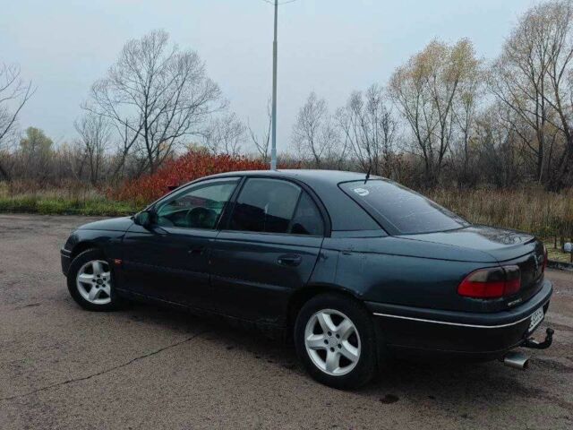 Черный Опель Омега, объемом двигателя 2 л и пробегом 335 тыс. км за 2400 $, фото 4 на Automoto.ua