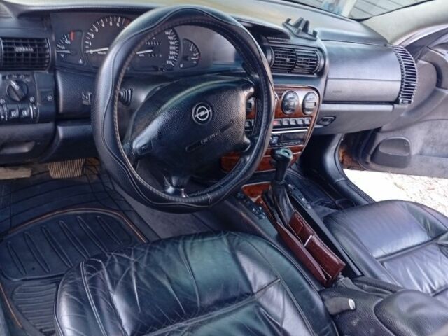 Черный Опель Омега, объемом двигателя 3 л и пробегом 2 тыс. км за 2500 $, фото 10 на Automoto.ua