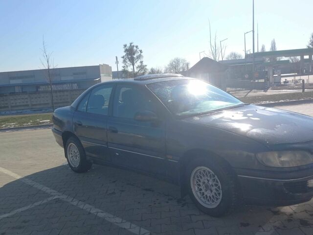 Черный Опель Омега, объемом двигателя 2 л и пробегом 100 тыс. км за 2100 $, фото 3 на Automoto.ua