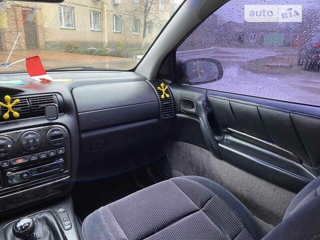 Чорний Опель Омега, об'ємом двигуна 2 л та пробігом 365 тис. км за 2700 $, фото 2 на Automoto.ua