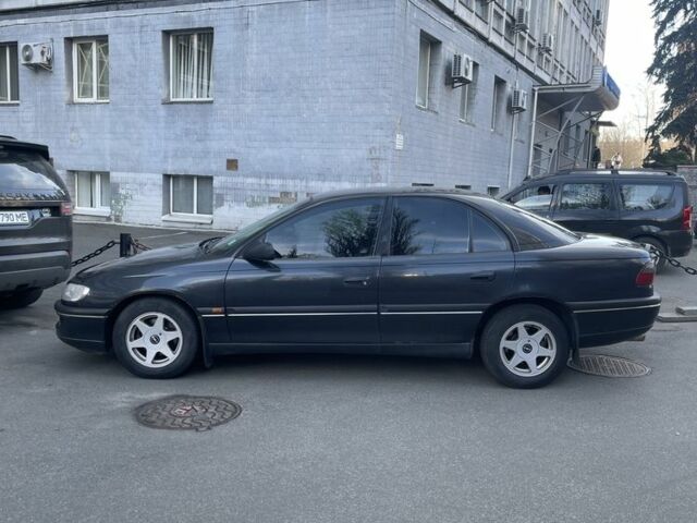 Чорний Опель Омега, об'ємом двигуна 2 л та пробігом 302 тис. км за 3000 $, фото 1 на Automoto.ua