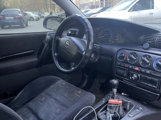 Чорний Опель Омега, об'ємом двигуна 2 л та пробігом 302 тис. км за 3000 $, фото 5 на Automoto.ua