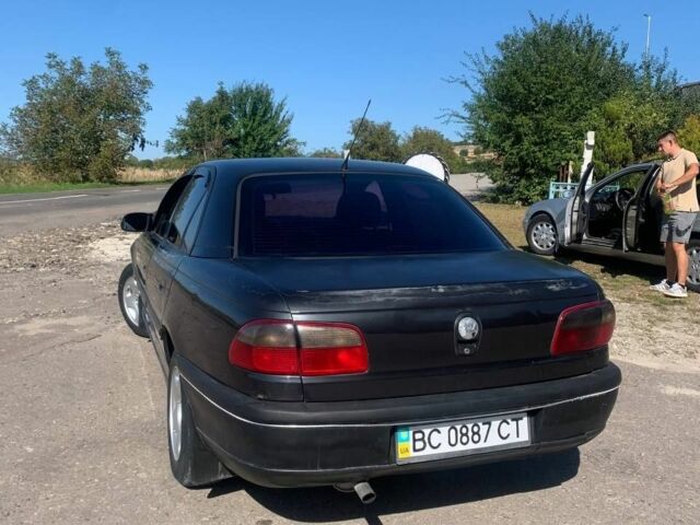 Черный Опель Омега, объемом двигателя 2 л и пробегом 287 тыс. км за 1750 $, фото 1 на Automoto.ua