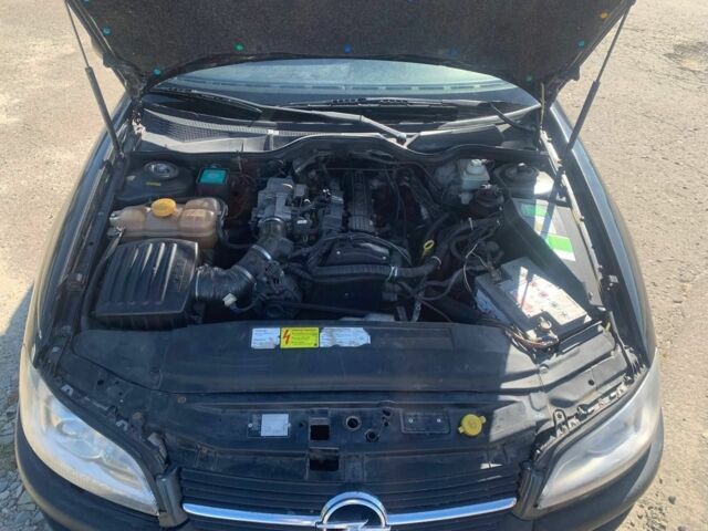 Черный Опель Омега, объемом двигателя 2 л и пробегом 287 тыс. км за 1750 $, фото 6 на Automoto.ua