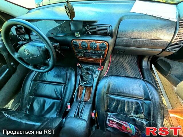 Черный Опель Омега, объемом двигателя 2.5 л и пробегом 485 тыс. км за 3200 $, фото 1 на Automoto.ua