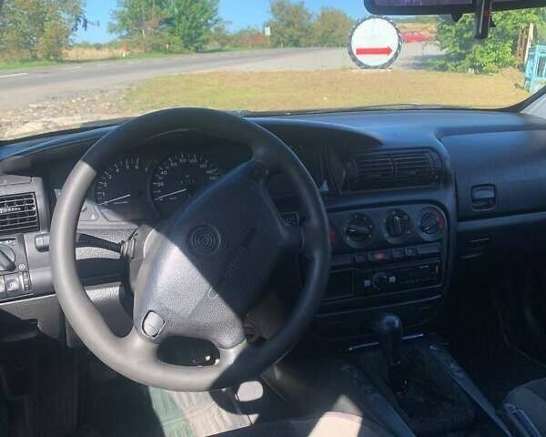 Черный Опель Омега, объемом двигателя 2 л и пробегом 250 тыс. км за 1300 $, фото 2 на Automoto.ua