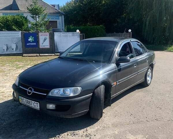 Черный Опель Омега, объемом двигателя 2 л и пробегом 250 тыс. км за 1300 $, фото 4 на Automoto.ua
