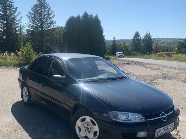 Черный Опель Омега, объемом двигателя 2 л и пробегом 287 тыс. км за 1750 $, фото 2 на Automoto.ua