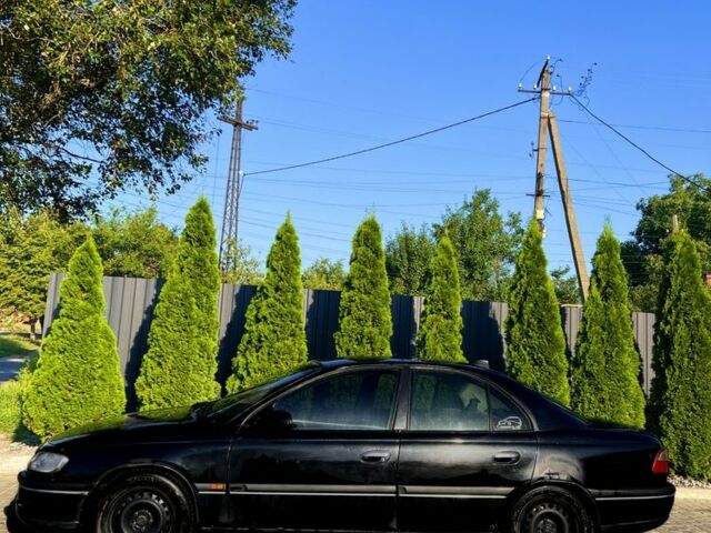 Черный Опель Омега, объемом двигателя 2 л и пробегом 516 тыс. км за 2000 $, фото 1 на Automoto.ua