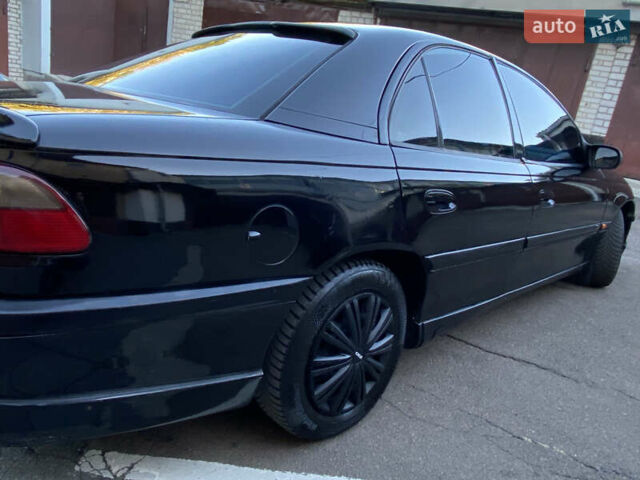 Чорний Опель Омега, об'ємом двигуна 2.5 л та пробігом 485 тис. км за 3000 $, фото 21 на Automoto.ua