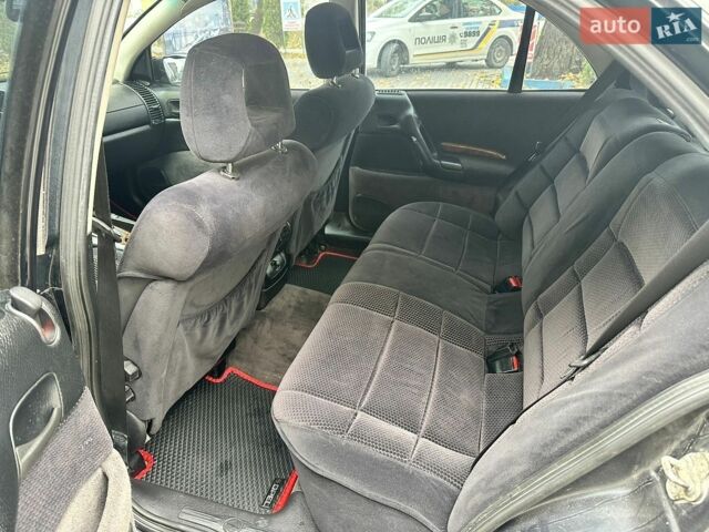 Черный Опель Омега, объемом двигателя 2.5 л и пробегом 320 тыс. км за 2600 $, фото 12 на Automoto.ua