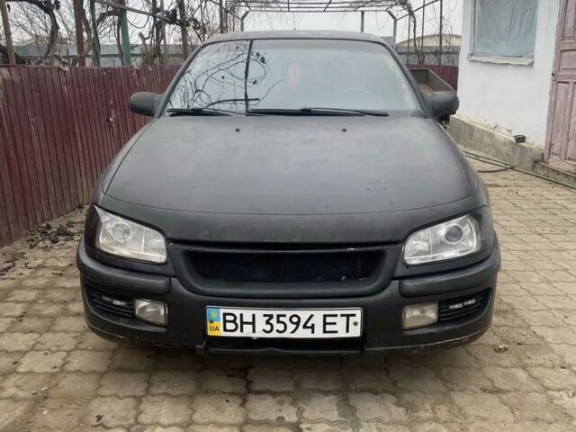 Чорний Опель Омега, об'ємом двигуна 2 л та пробігом 300 тис. км за 2100 $, фото 2 на Automoto.ua