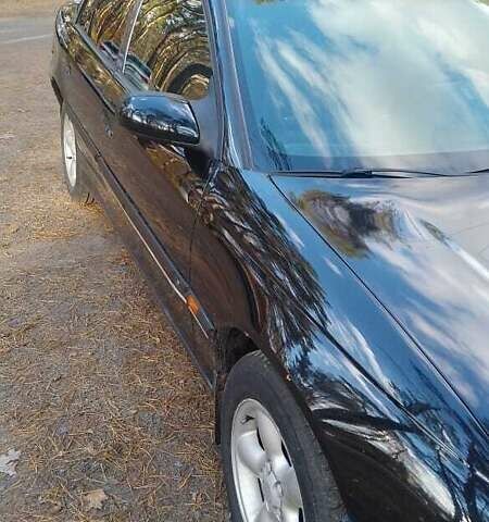 Чорний Опель Омега, об'ємом двигуна 2 л та пробігом 300 тис. км за 2600 $, фото 4 на Automoto.ua