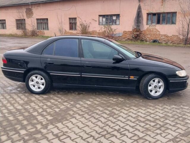 Черный Опель Омега, объемом двигателя 2.5 л и пробегом 205 тыс. км за 2700 $, фото 1 на Automoto.ua