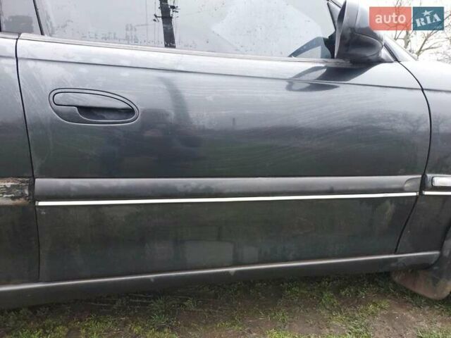 Чорний Опель Омега, об'ємом двигуна 2.5 л та пробігом 340 тис. км за 2596 $, фото 13 на Automoto.ua