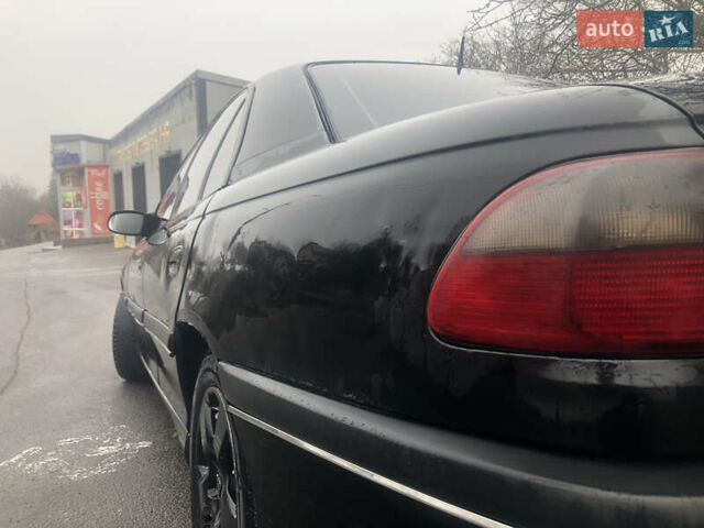 Черный Опель Омега, объемом двигателя 2 л и пробегом 298 тыс. км за 2399 $, фото 6 на Automoto.ua