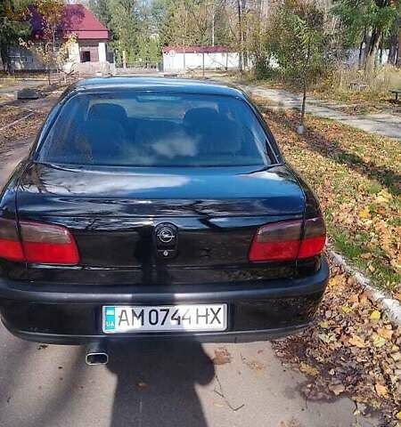 Чорний Опель Омега, об'ємом двигуна 2 л та пробігом 300 тис. км за 2600 $, фото 1 на Automoto.ua