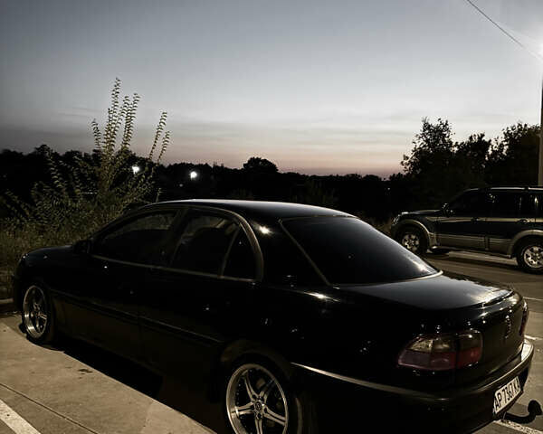 Чорний Опель Омега, об'ємом двигуна 2 л та пробігом 400 тис. км за 3000 $, фото 4 на Automoto.ua