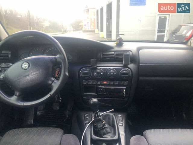 Черный Опель Омега, объемом двигателя 2 л и пробегом 298 тыс. км за 2399 $, фото 18 на Automoto.ua