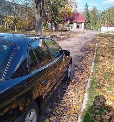 Чорний Опель Омега, об'ємом двигуна 2 л та пробігом 300 тис. км за 2600 $, фото 10 на Automoto.ua