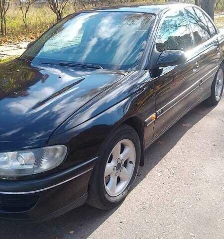 Чорний Опель Омега, об'ємом двигуна 2 л та пробігом 300 тис. км за 2600 $, фото 14 на Automoto.ua